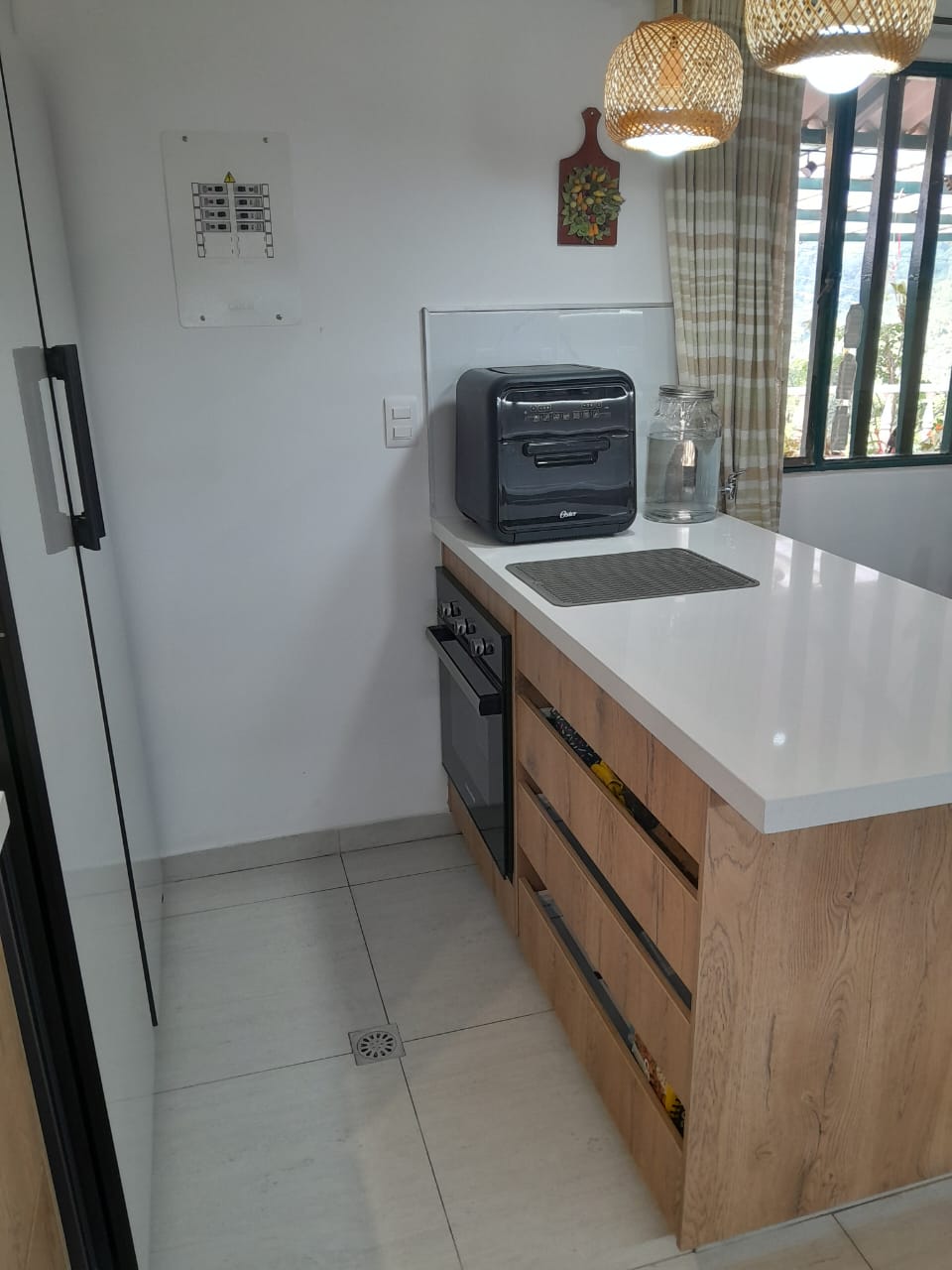 Vista completa cocina remodelada Bogotá — proyecto 3