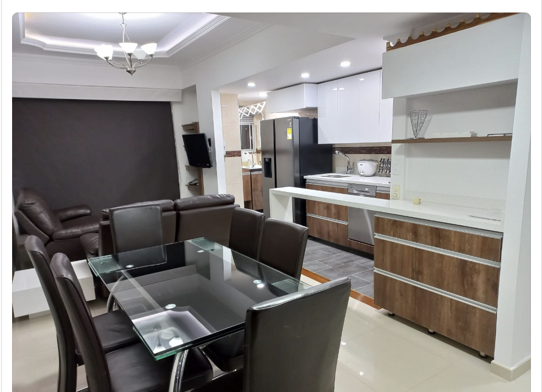 Remodelación integral de apartamento en Bogotá — sala, comedor y cocina transformados por Estructura
